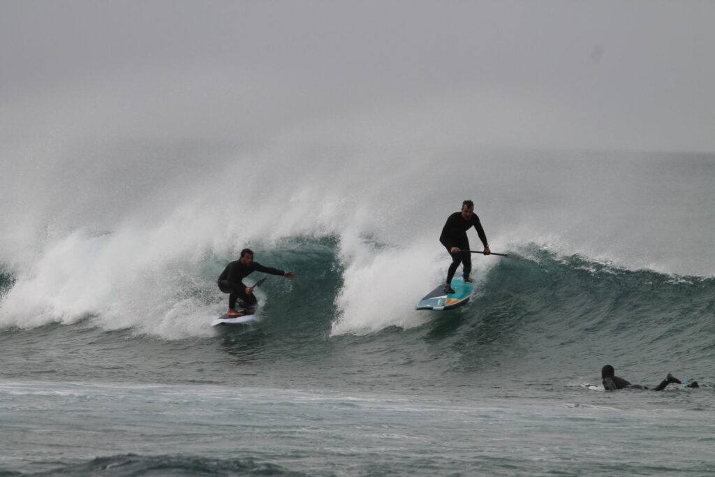 Why is it essential to have a local SUP surfing guide when exploring Algarve's hidden gems?